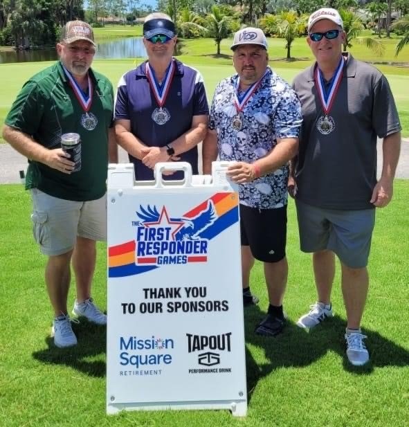 A team consisting of School Resource Corporal William Hill - OCSO, School Resource Deputy Tim Higgins - OCSO, School Resource Deputy Pavvo Minuse - IRSO and School Resource Officer Skip Eddings - OCPD, took silver in the team golf event.
